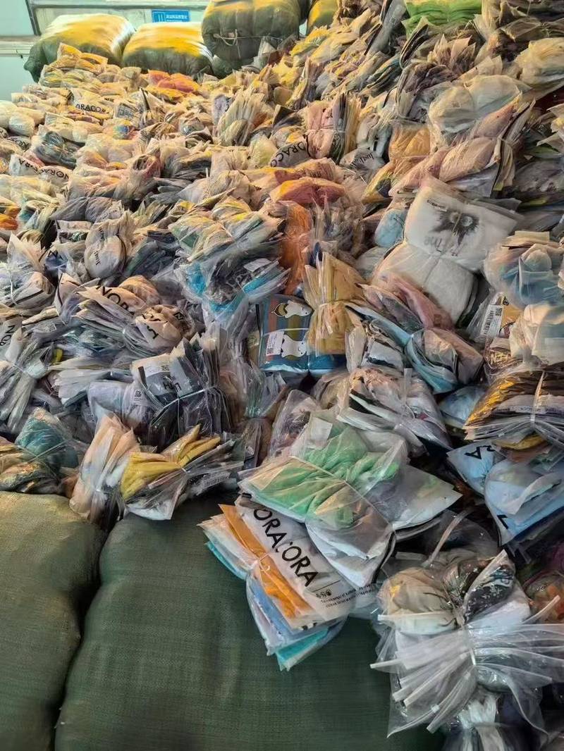 Warehouse floor packed with apparel bales