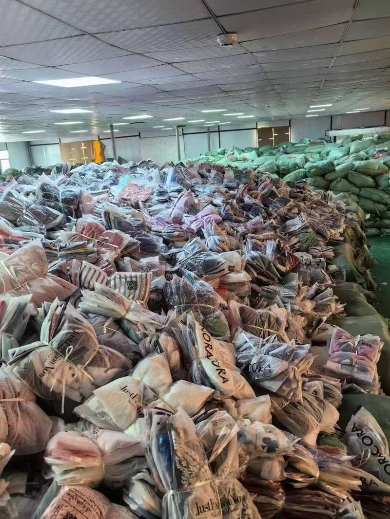 Mountains of bagged wholesale garments